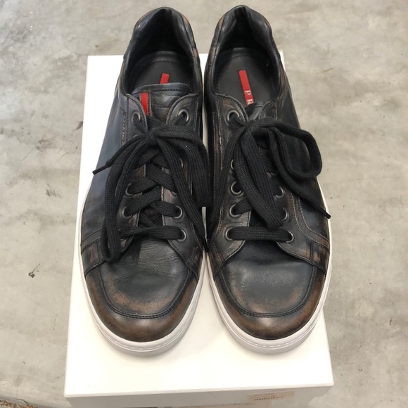 Prada Men’s black leather burnished sneake… - Picture 1 of 6